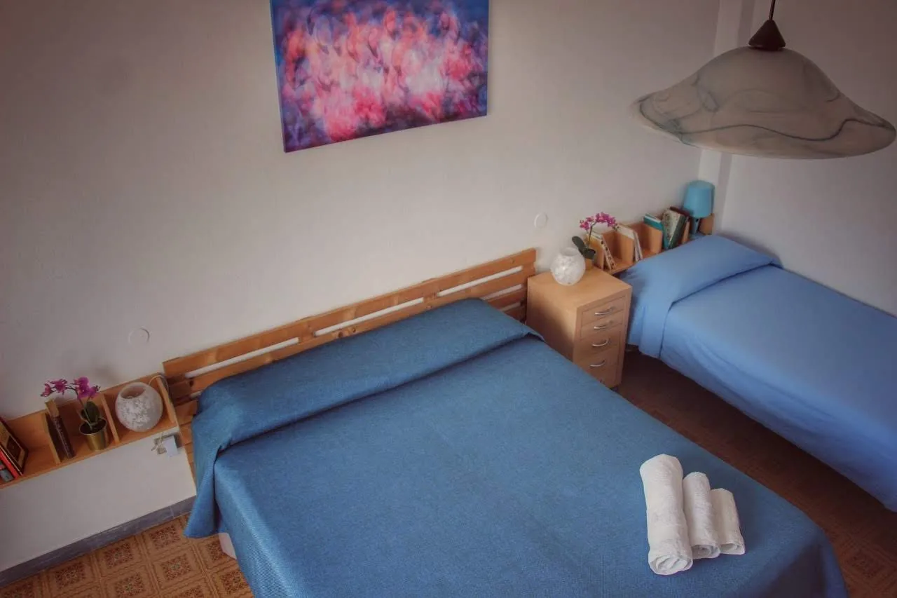 Camera con letto matrimoniale e singolo